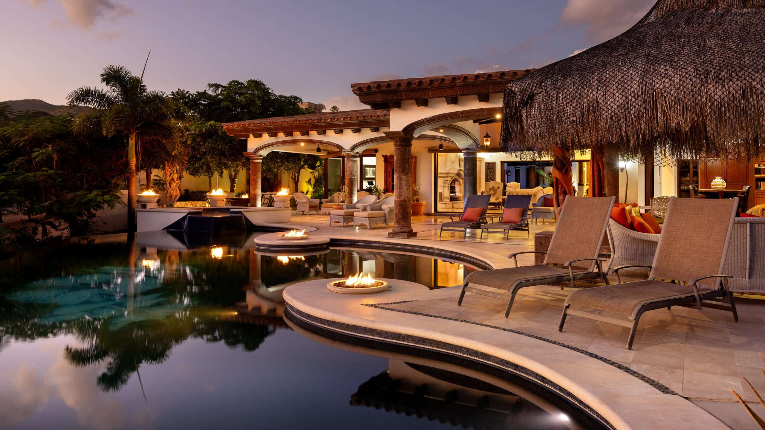 Cabo del Sol Las Posadas Introducing Villa de Paz, an exceptional single-level estate nestled within the iconic, guard-gated community of Cabo del Sol, a prestigious master-planned enclave now entering its most exclusive era. Framed by dramatic golf-course vistas and the soft shimmer of the Sea of Cortez, this residence blends timeless hacienda architecture with sophisticated design and an effortless indoor-outdoor flow that defines the finest homes in Los Cabos.From the moment you step inside, the home reveals a warm yet elegant ambiance. Grand, naturally lit living spaces with high ceilings and artisan finishes open seamlessly through expansive sliding glass doors, inviting the outdoors in and creating a lifestyle of breezy, sun-filled ease. The open-concept living, dining, and gourmet kitchen serve as the heart of the homeperfect for quiet mornings, family gatherings, and elevated entertaining alike.The villa offers multiple spacious en-suite bedrooms, thoughtfully positioned for privacy and comfort, along with a versatile TV/guest suite ideal for extended family or visiting friends. Every room feels intentional, serene, and connected to the home's calming energy.Outdoors, Villa de Paz becomes a private resort. The expansive terrace features a sparkling pool and spa, shaded lounging areas, and multiple fire pits strategically placed to create intimate spaces for sunset for sale