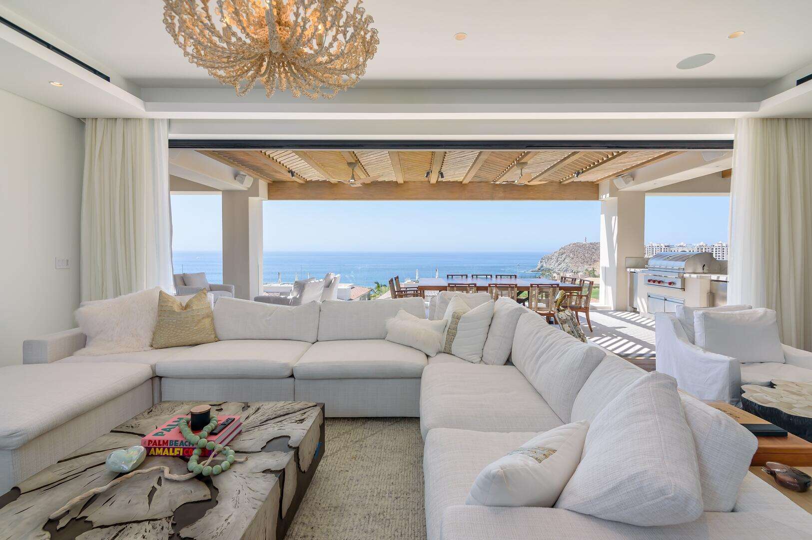 Cabo del Sol Cove Club Club Villa 12 is a stunning 4-bedroom residence within the private Cove Club at Cabo Del Sol, one of Los Cabos' most prestigious communities. Each bedroom is a full master suite, complemented by two half baths, one in the living area and one on the rooftop terrace. With over 3,600 sq. ft. under A/C and 1,100+ sq. ft. of terraces, the villa offers seamless indoor-outdoor living. The private rooftop features a pool and hot tub overlooking breathtaking ocean for sale